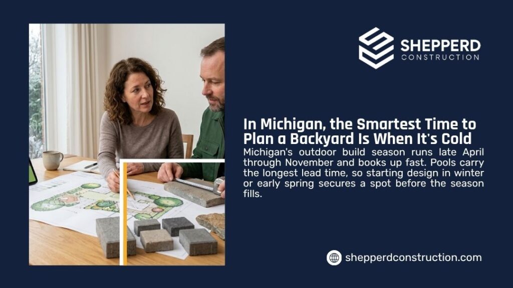 Why Hire a Design Build Company for Backyard
- Off-season backyard planning graphic by Shepperd Construction showing a couple reviewing landscape design plans and paver samples at a table